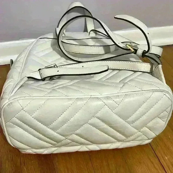 Michael Kors Abbey white quilted backpack. Silver hardware. Two zipper pockets. - Picture 8 of 12
